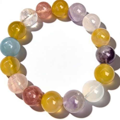 Natural crystal bracelet featuring 13mm beads and silver accents, handcrafted and one-of-a-kind. This versatile, high-end stretchy bead bracelet for women is perfect for personal wear or as a gift.